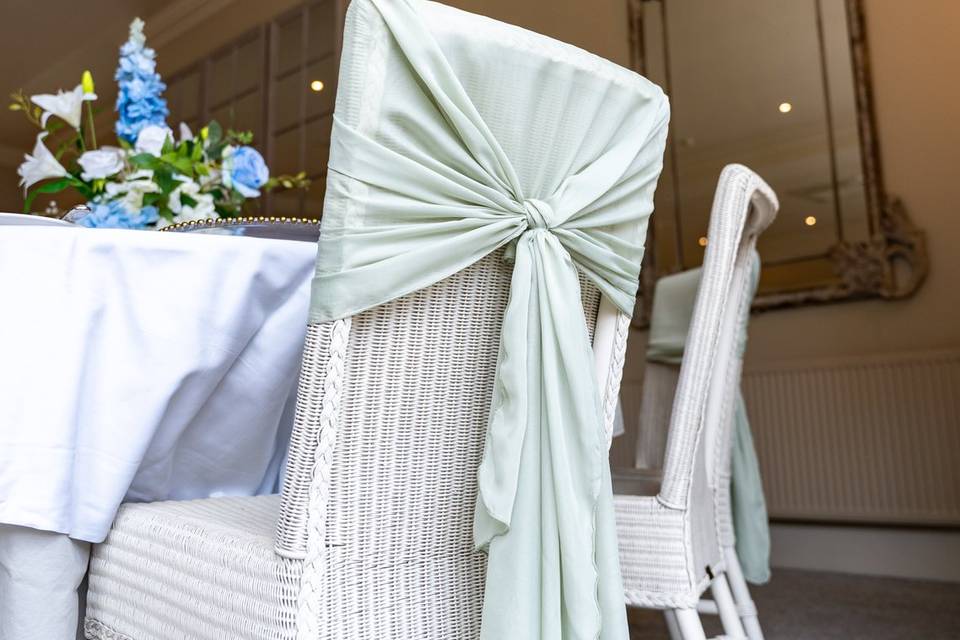 Chair with decorative sash