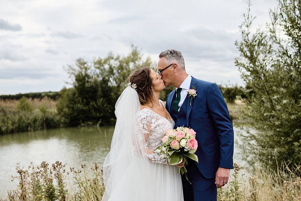 Kissing by the pond