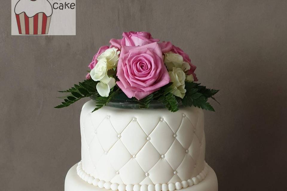 Quilted wedding cake with rose