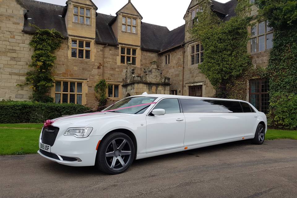 White stretch limousine