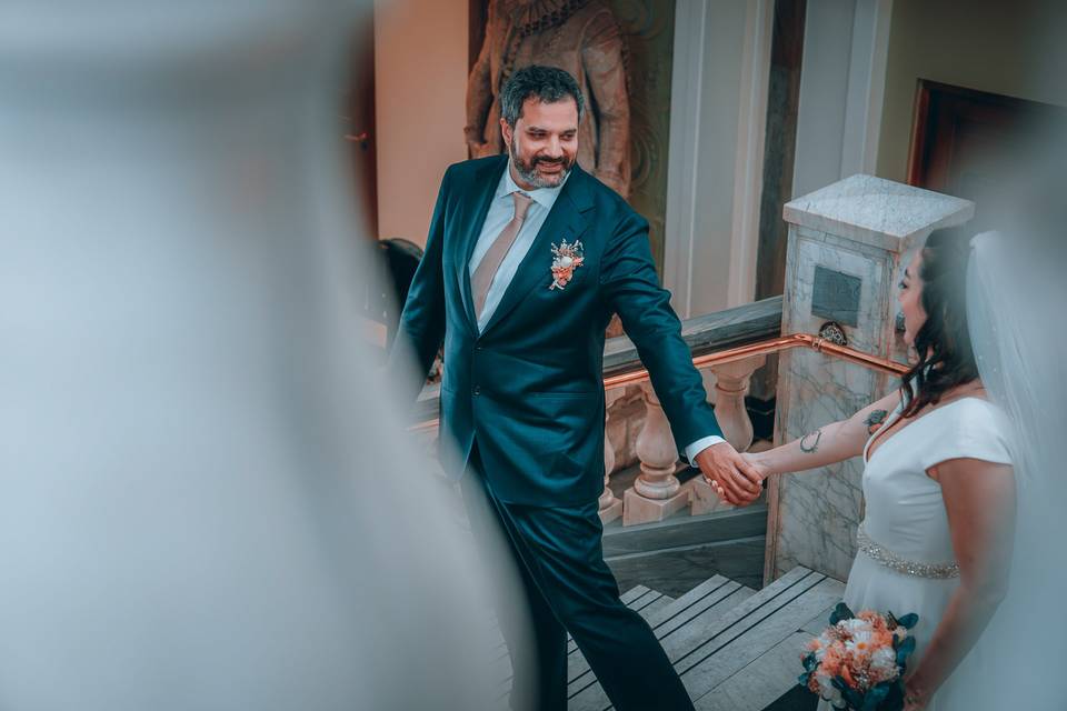 Groom on stairs