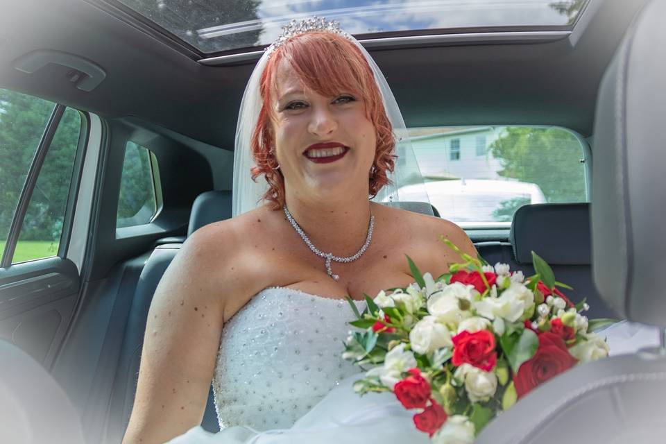 Bride in car