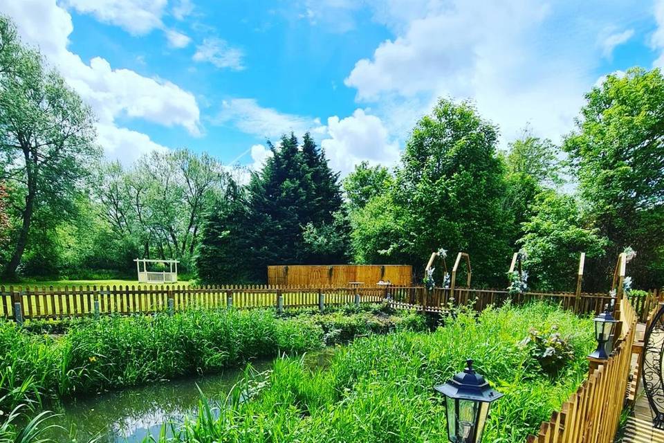 View over river to back garden