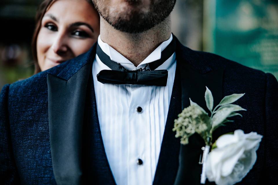 Bride peeking over shoulder