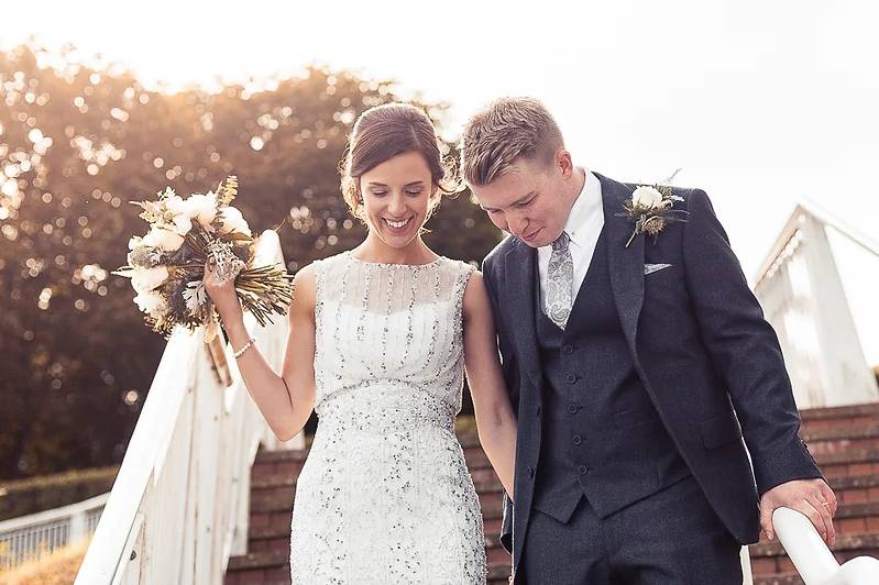 Bride and groom at sunset