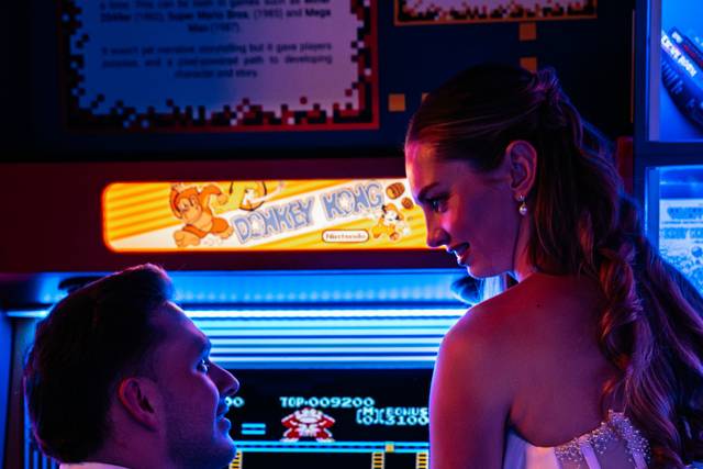 Couple in Retro Story Arcade