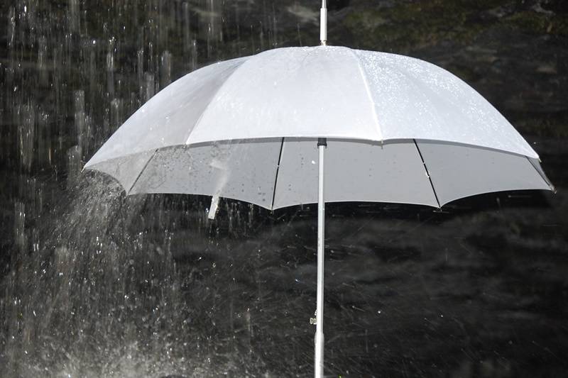 White umbrella for the bride