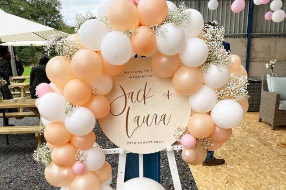 Welcome signage with balloons