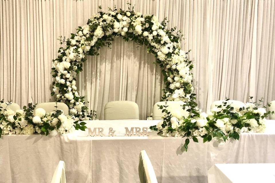 Ivory greenery floral arch