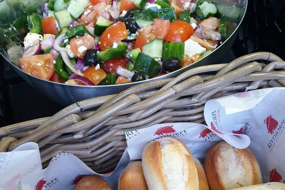 Greek salad and crusty baguettes