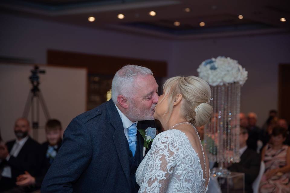 First kiss as newlyweds