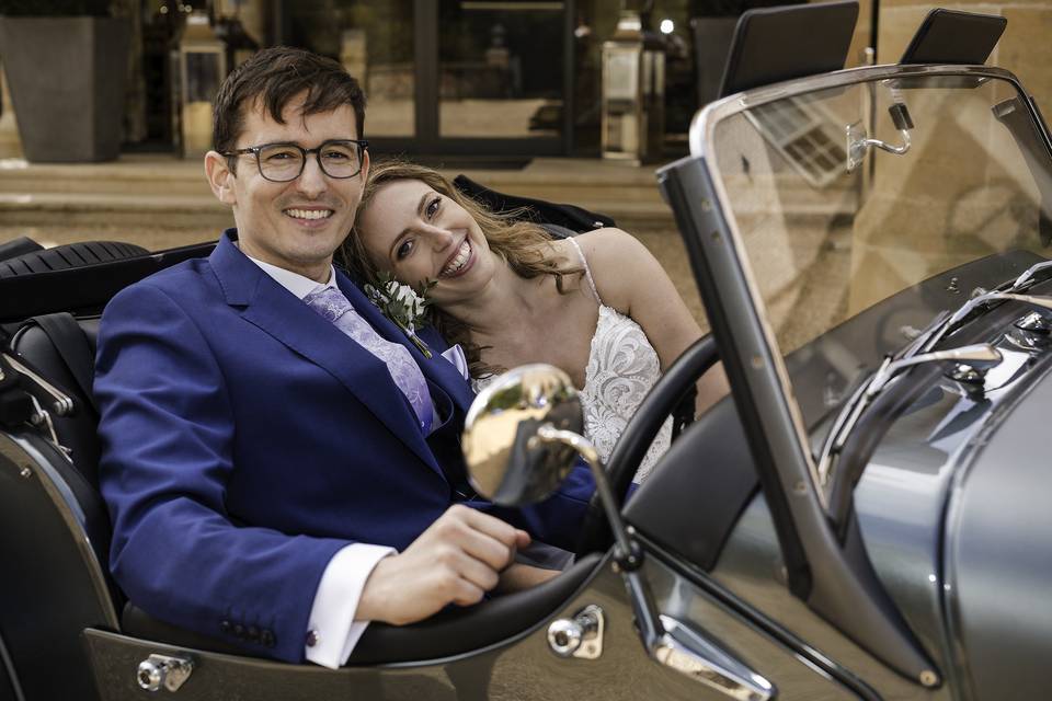 Bride & Groom in their Car