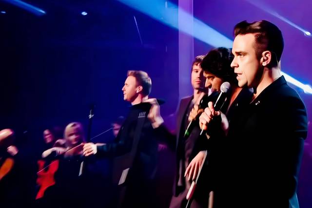 On stage with Take That