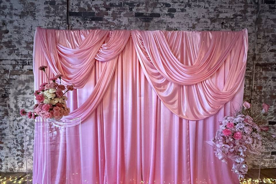 Pink satin drape backdrop