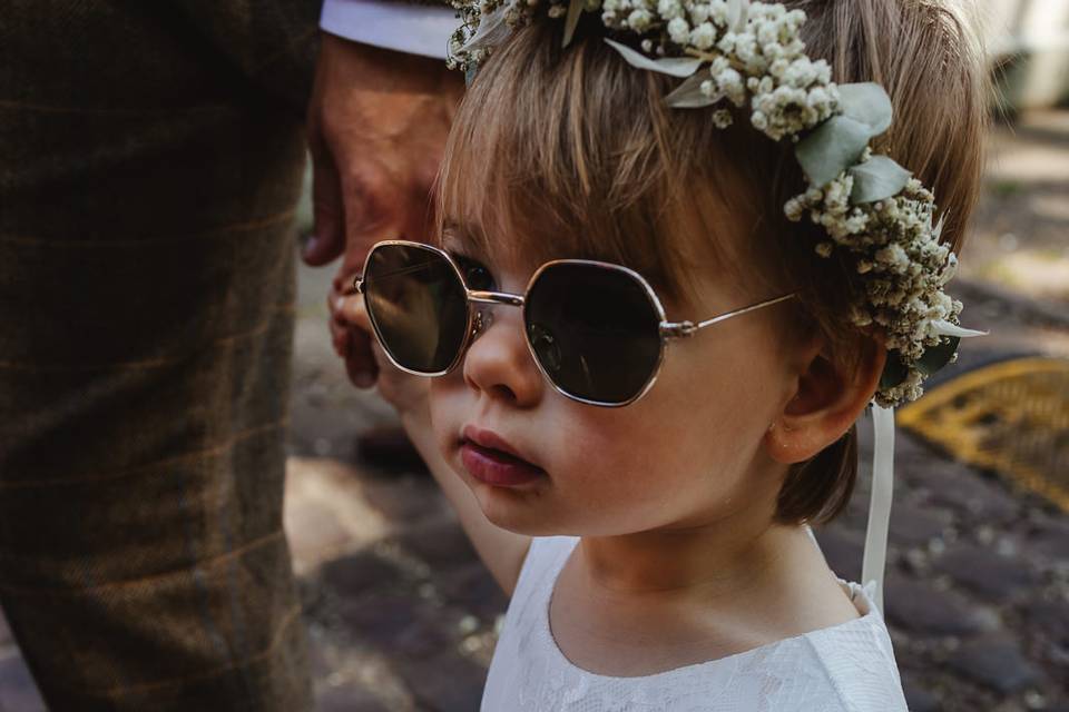 Young bridesmaid wearing shade