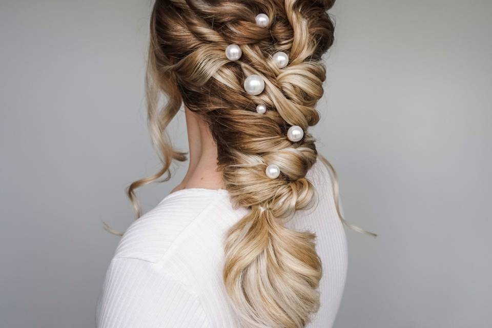 Statement plait and pearls