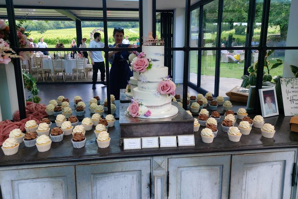 Semi naked cake with cupcakes