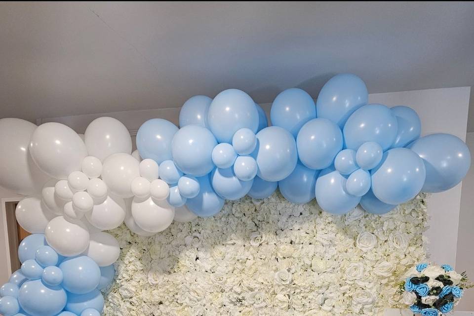 Flower wall and balloons
