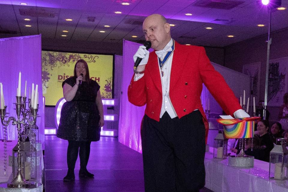 Newlyweds and their toastmaster