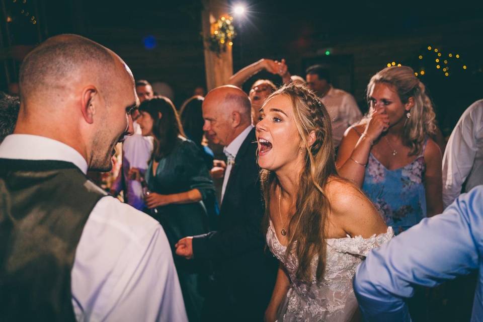 Bride and groom singing