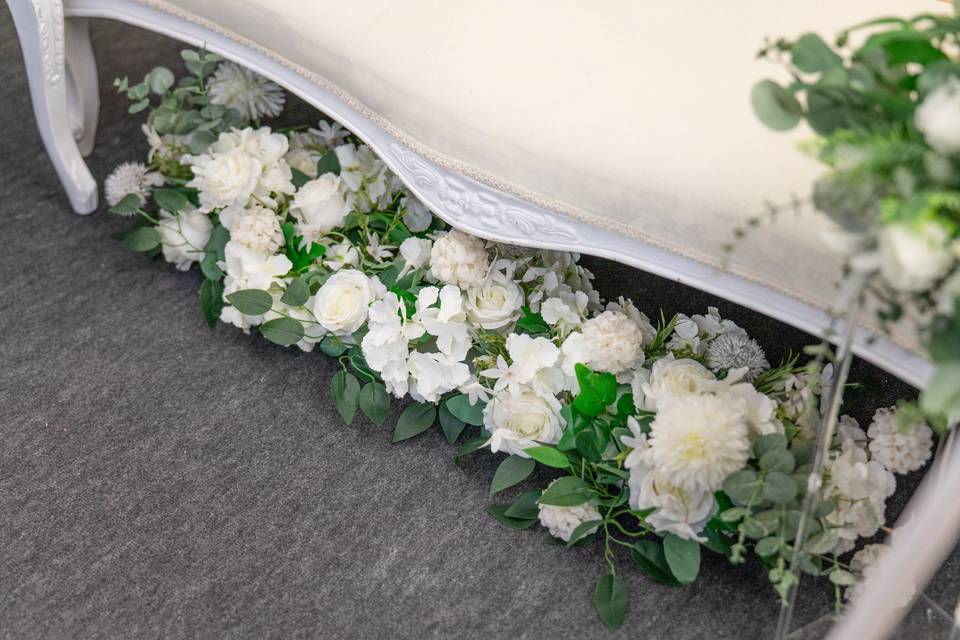 Low white floral runner on the floor