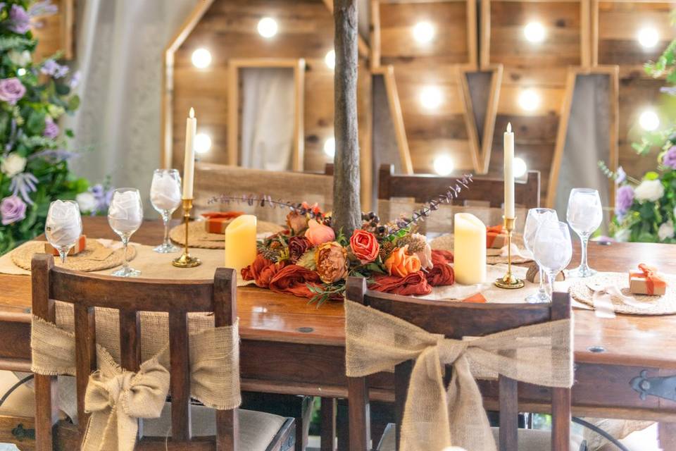 Tall autumnal tree centerpiece on a banquet table