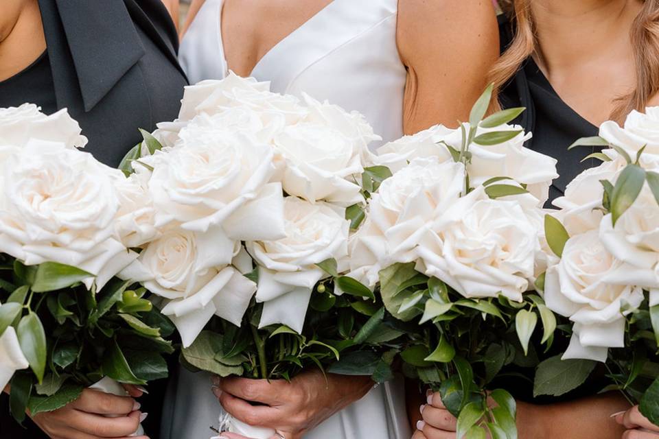 Four white roses bouquet