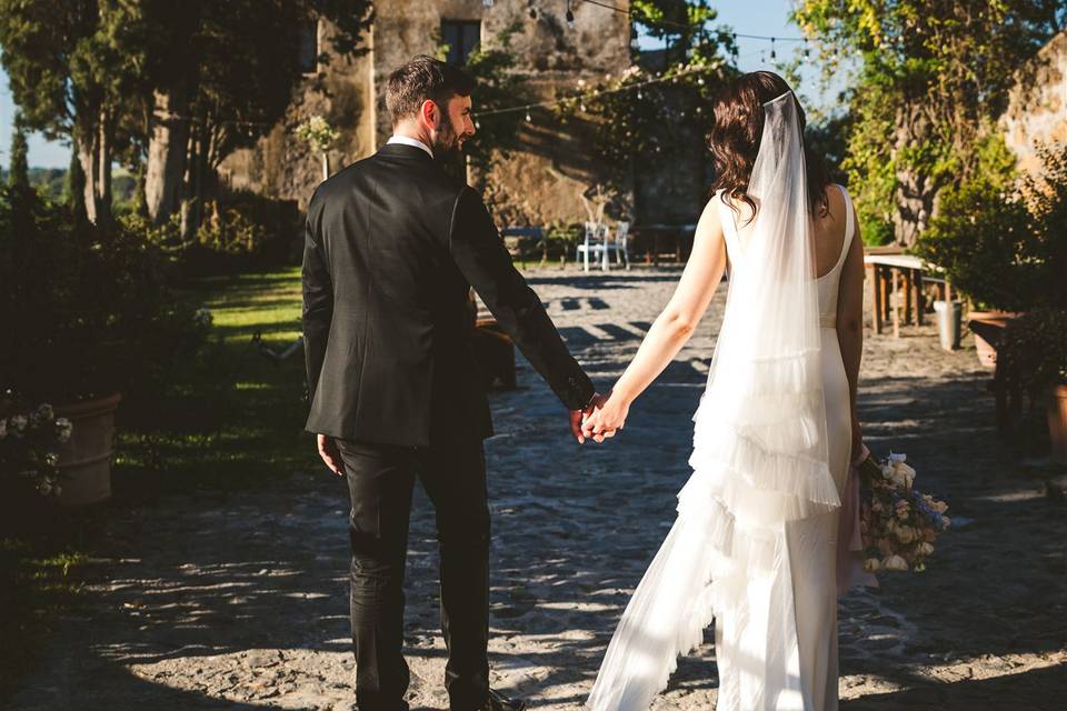 Happy couple walking at Borgo