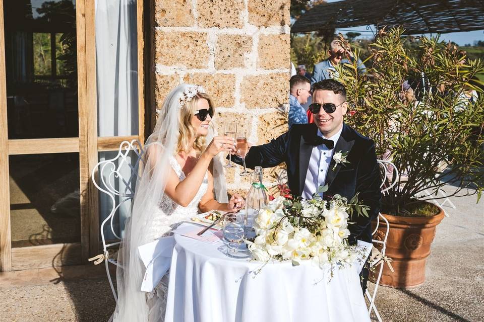 Happy couple drinks reception