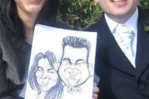 Guests with their caricature