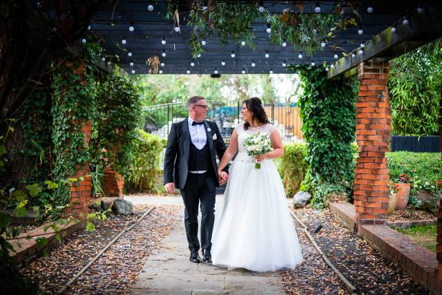 Bride and groom walking