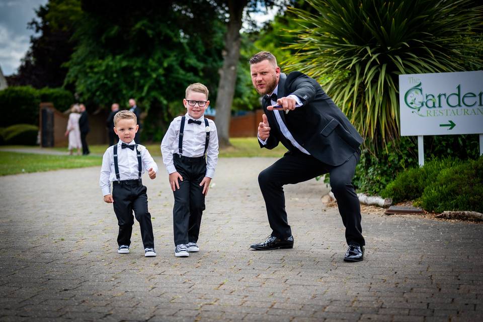 Posing with page boys