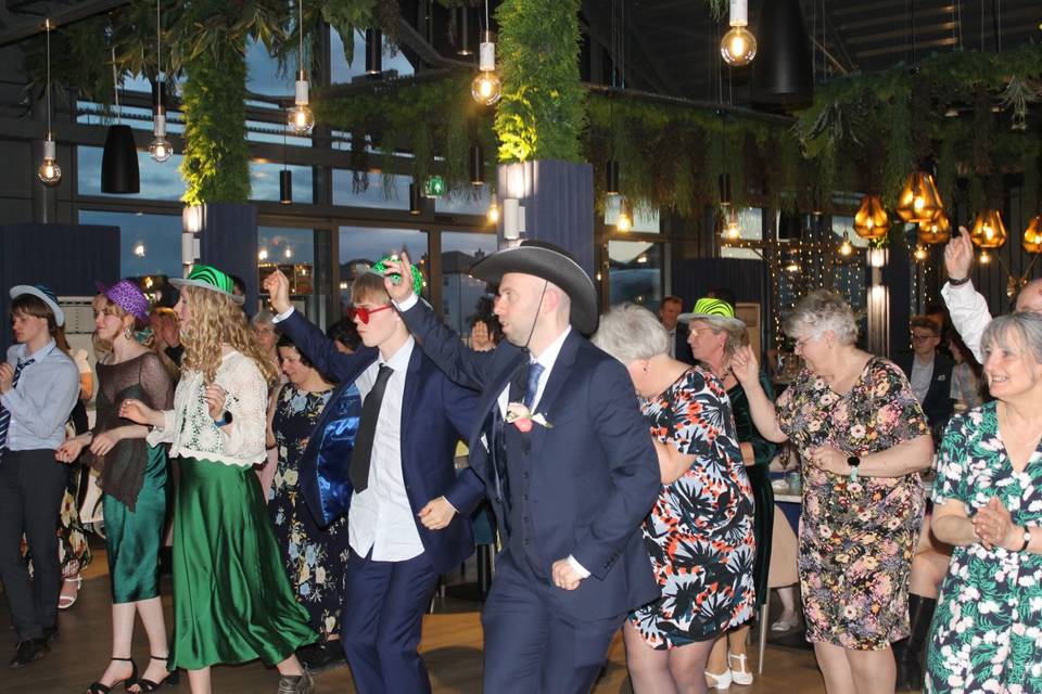 Bride & guests line dancing