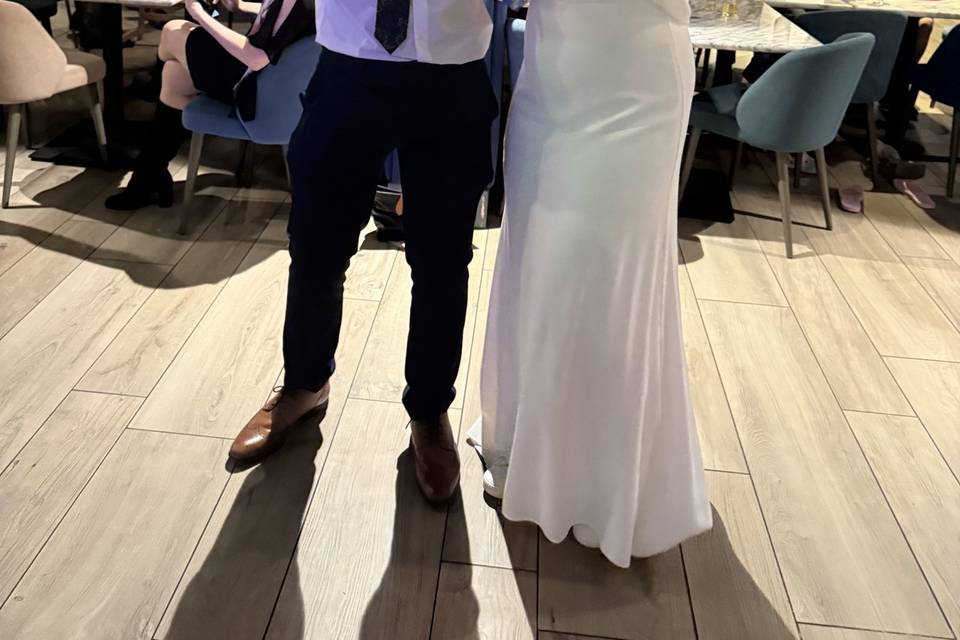 Bride & Groom posing with prop