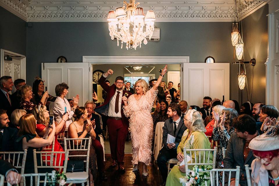 Groom and his mum dancing in.