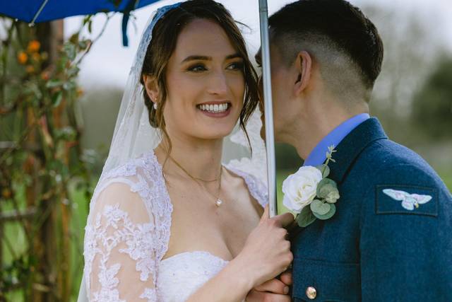 Wedding couple in the rain
