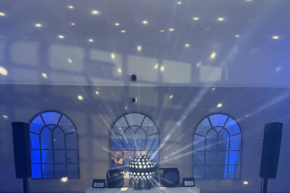 White DJ booth & Mirror ball