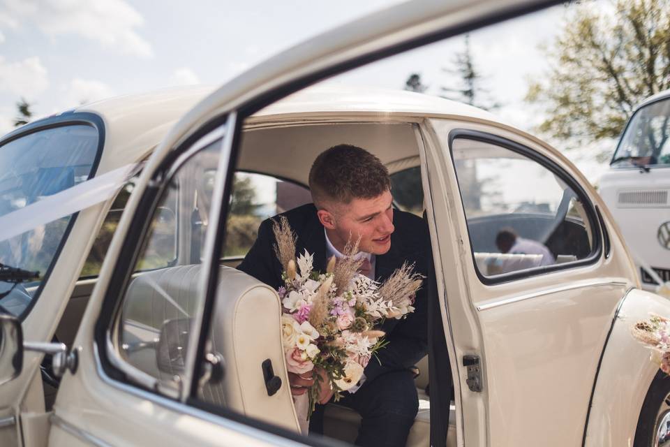 Holding bouquet in car