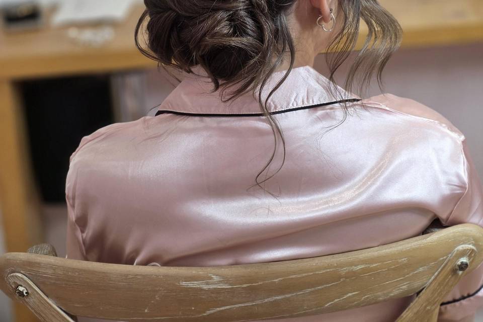 Plaited low bun