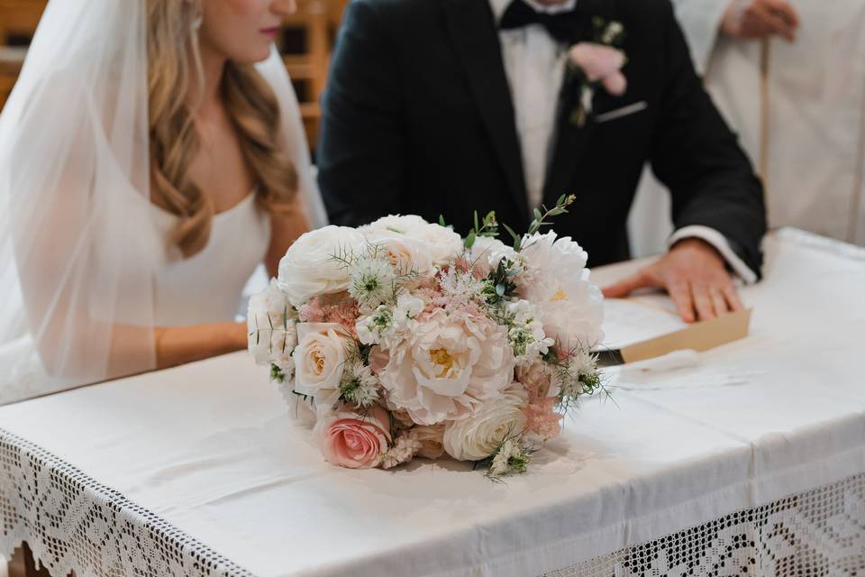 Wedding flowers at the altar