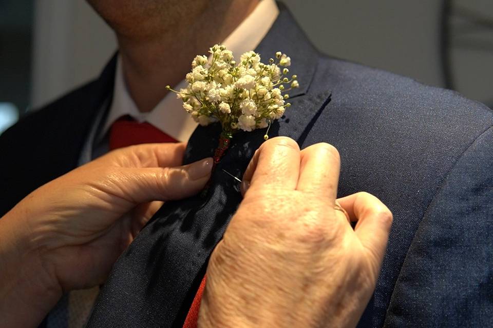 Putting the buttonhole on