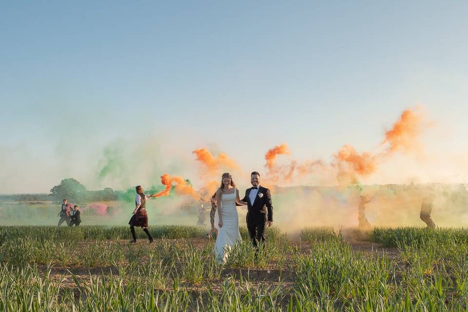 Coloured smoke in field