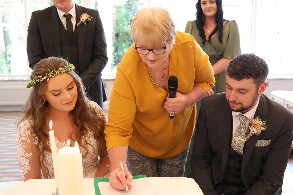 Signing the papers