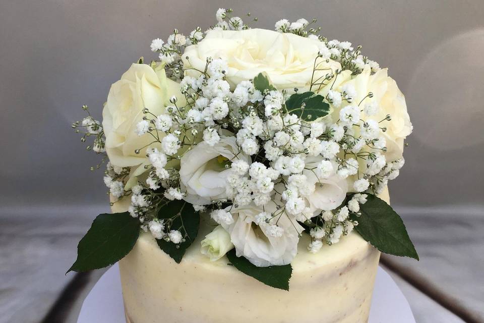 Semi-naked cake with a bouquet