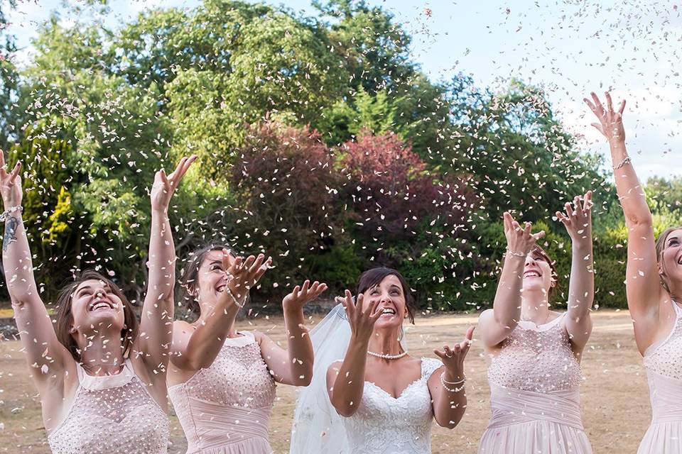 Bridesmaids with confetti