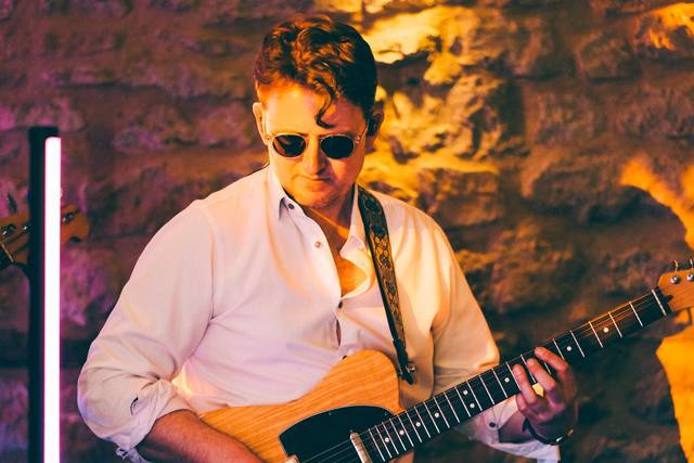 Our lead guitar player Tom
