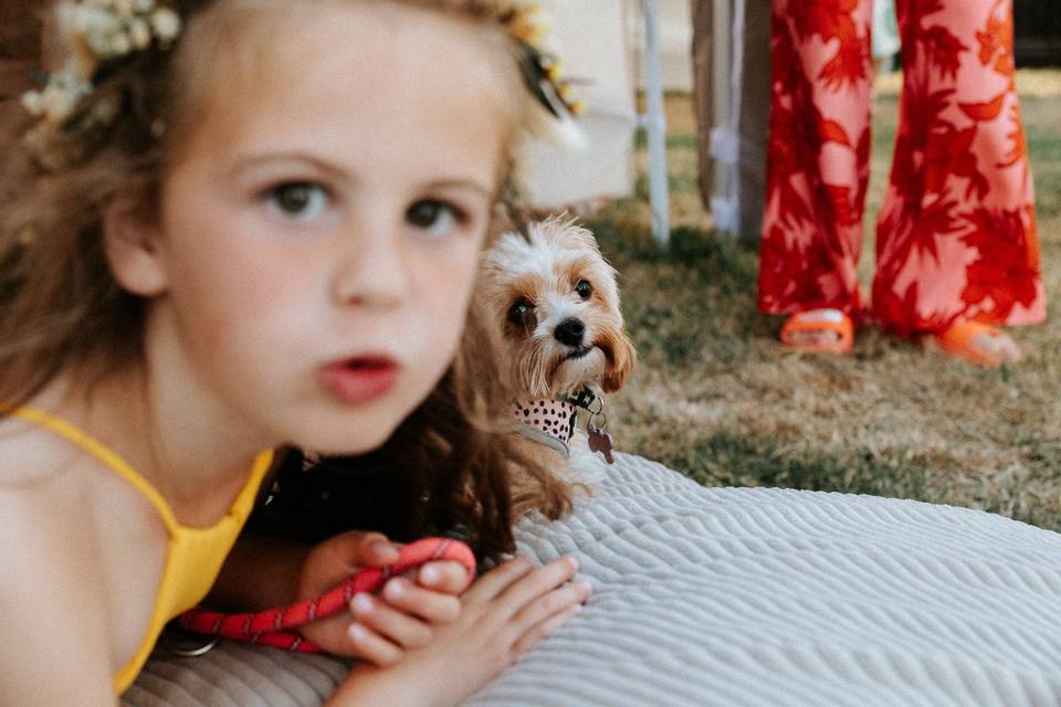 Flower girl and her pet dog