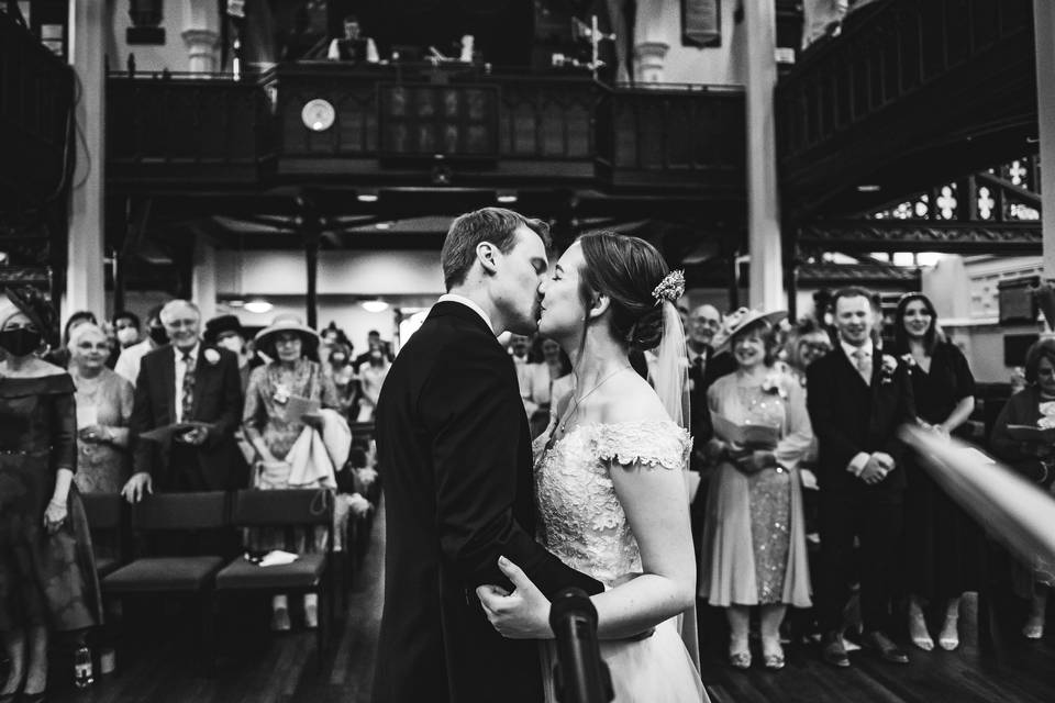 First kiss, in church.