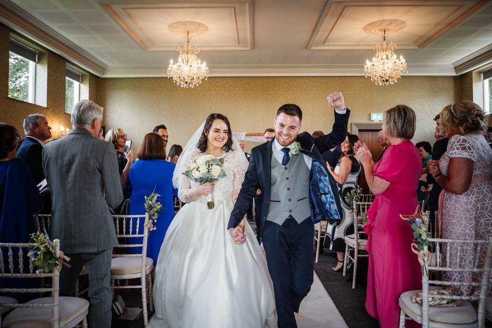 Couple leaving ceremony