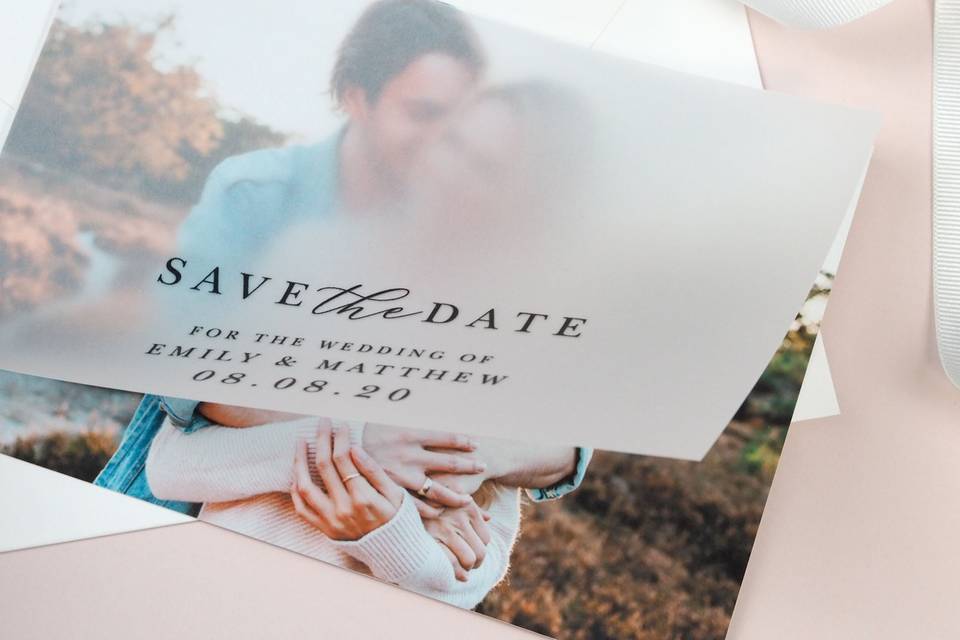 Vellum layered save the dates